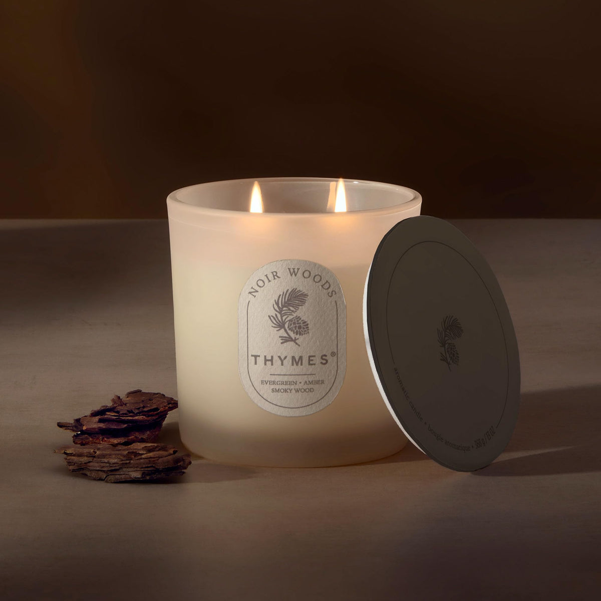 Thymes Noir Woods Scented Candles for Home Decor – Notes of Fresh Evergreen, Smoky Wood & Golden Amber – Luxury Home Fragrance Gifts for Women & Men – (2 Wick Medium Candle, 13oz)