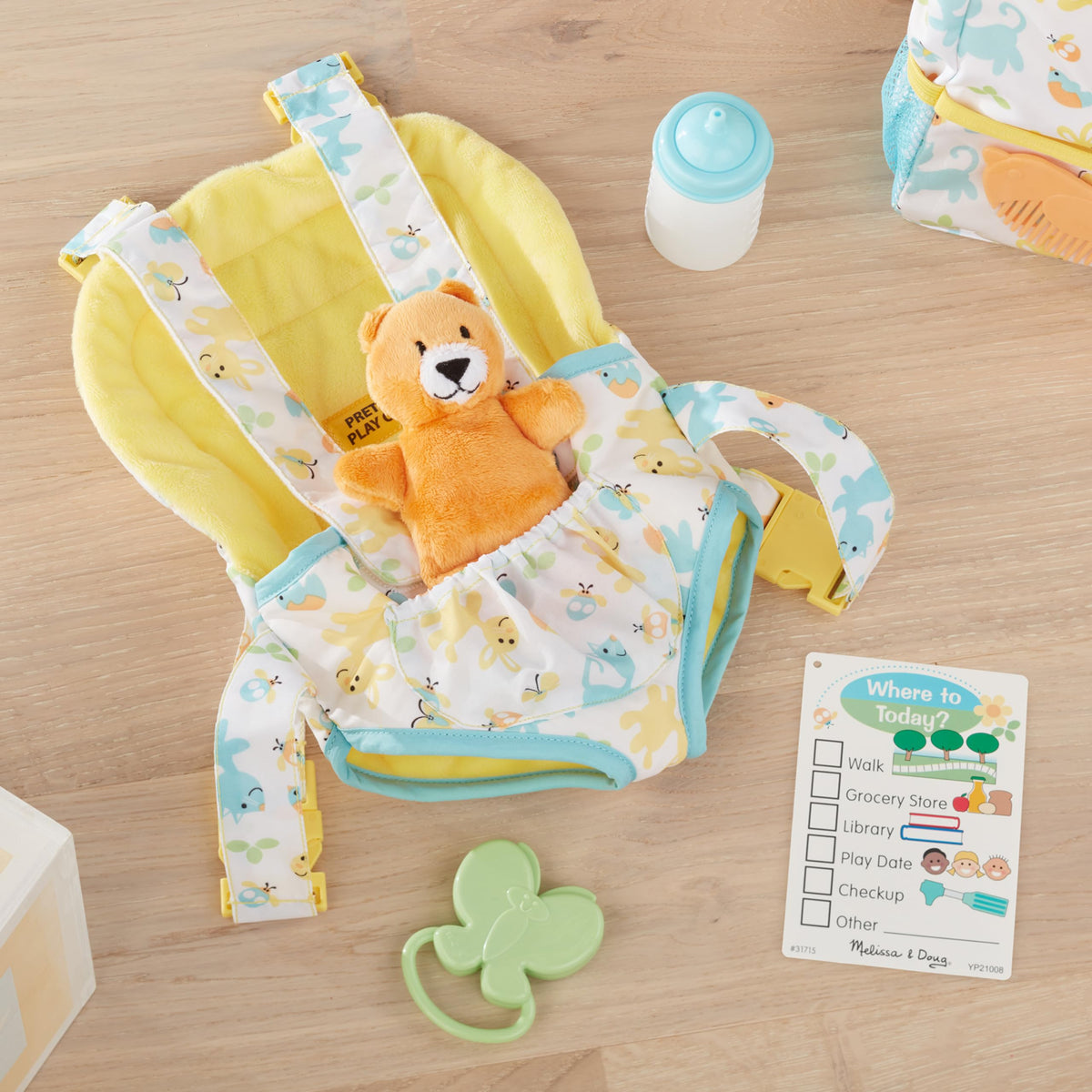 Melissa & Doug Mine to Love Carrier Play Set for Baby Dolls with Toy Bear, Bottle, Rattle, Activity Card